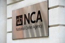 Ảnh tư liệu không đề ngày tháng chụp biển hiệu của Cơ quan Phòng chống Tội phạm Quốc gia Vương quốc Anh (NCA). (Ảnh: Kirsty O'Connor/PA)